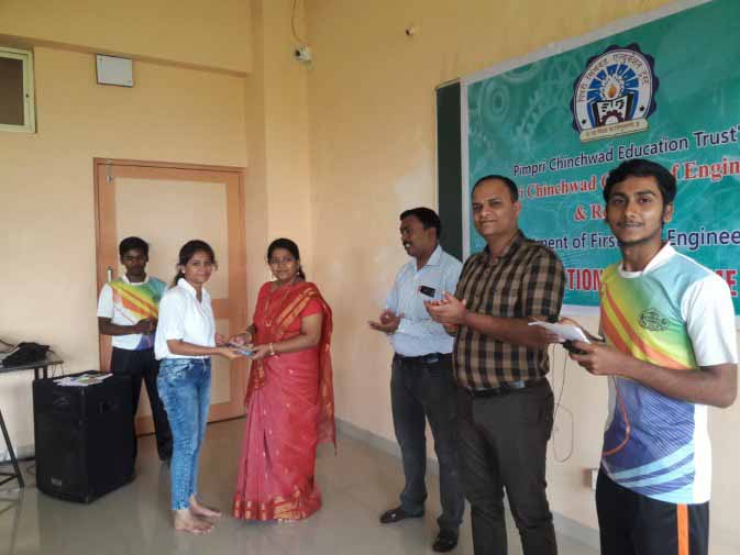 Students have been awarded for doing nice yoga by giving gifts., PCCOER